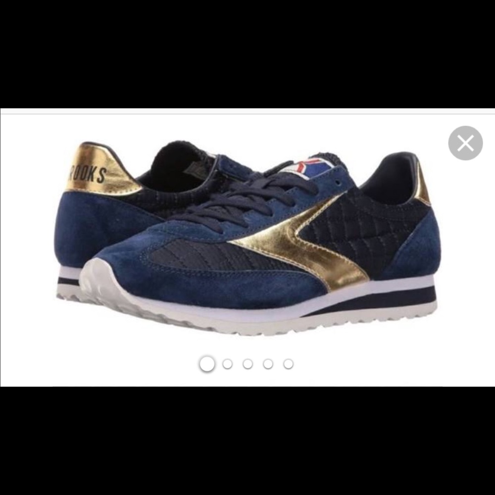 Brooks sneakers. Navy blue with gold accents